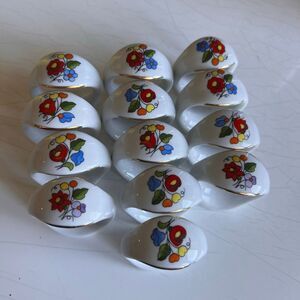 vintage Kalocsa porcelain napkin rings from Hungary, which are hand-painted